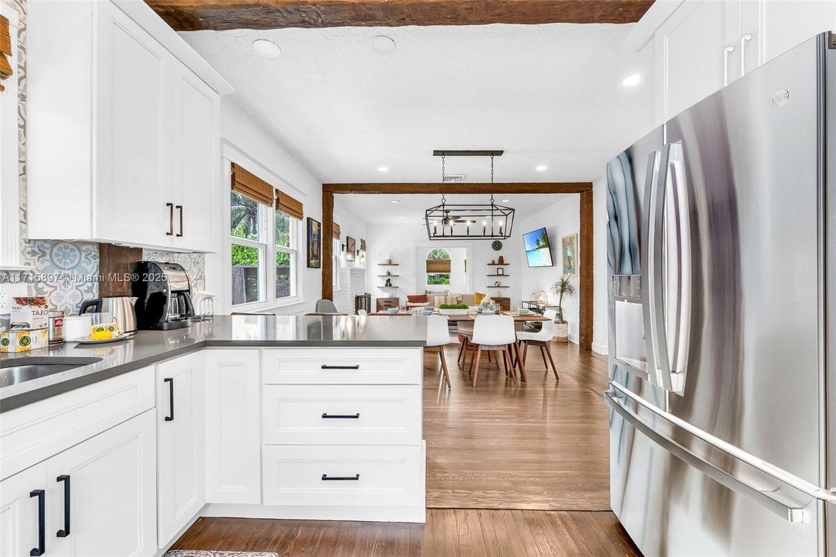 Dining room, Interior, Kitchen, Pendant Lights, Recessed Lighting, Stainless Steel Appliances, Wood Texture Flooring