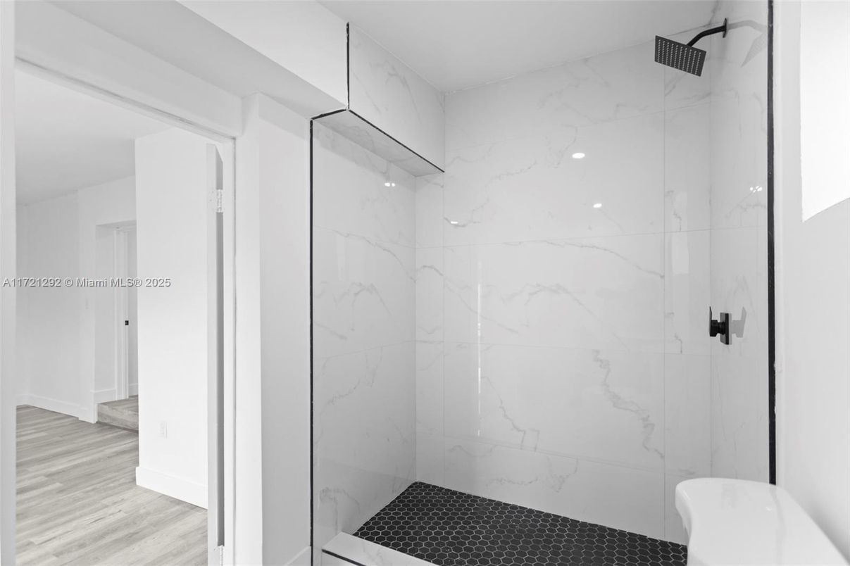 Bathroom, Glass Shower, Interior, Marble Walls, Wood Texture Flooring