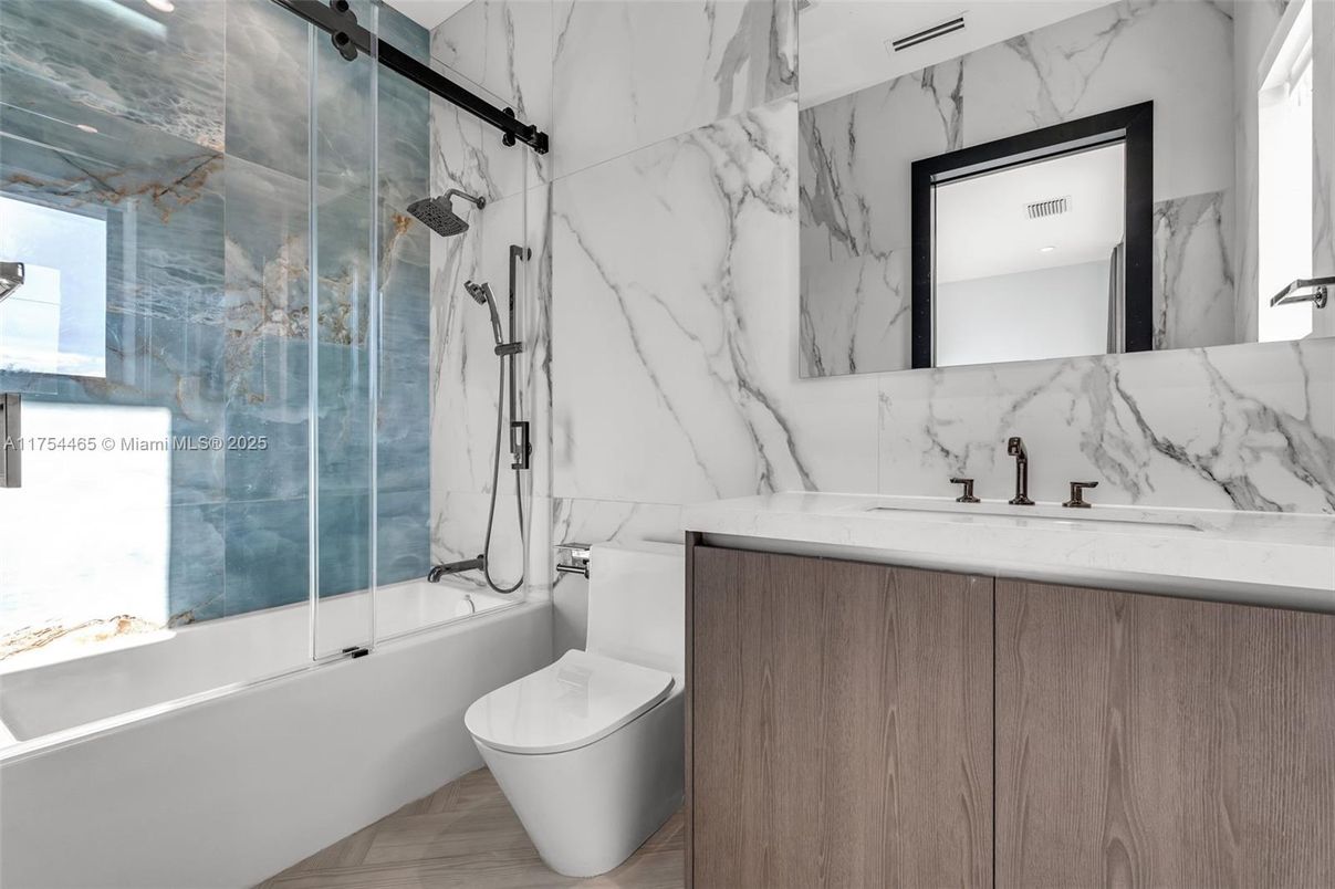 Bathroom, Glass Shower, Interior, Marble Walls, Recessed Lighting, Wood Texture Flooring