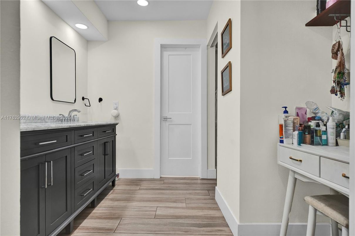 Bathroom, Dual Sink Vanities, Interior, Recessed Lighting, Wood Texture Flooring
