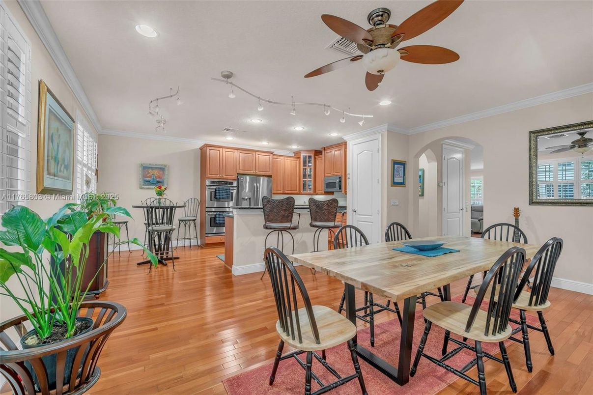 Dining room, Interior, Kitchen, Recessed Lighting, Stainless Steel Appliances, Wood Texture Flooring