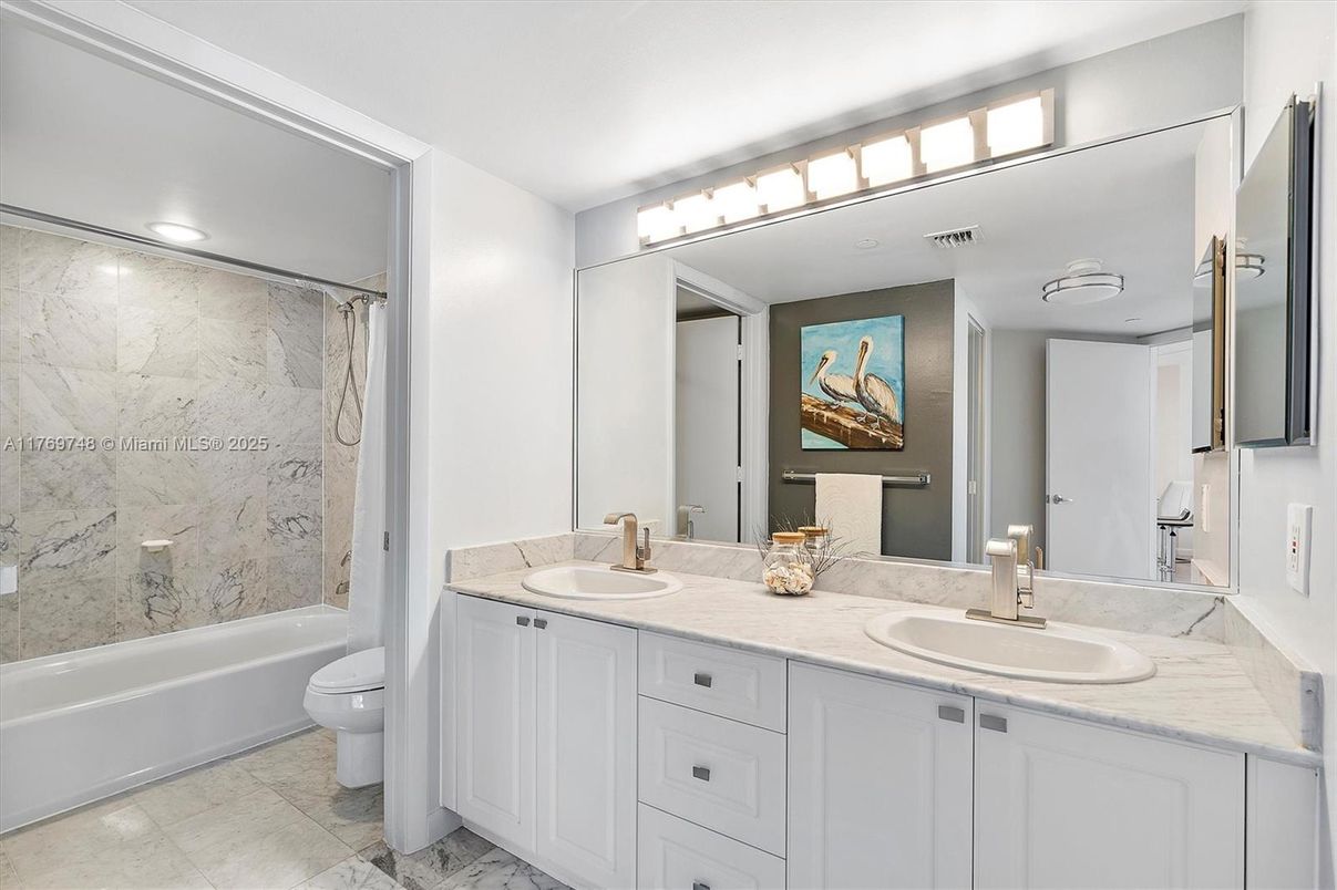 Bathroom, Dual Sink Vanities, Interior, Marble, Marble Walls, Recessed Lighting