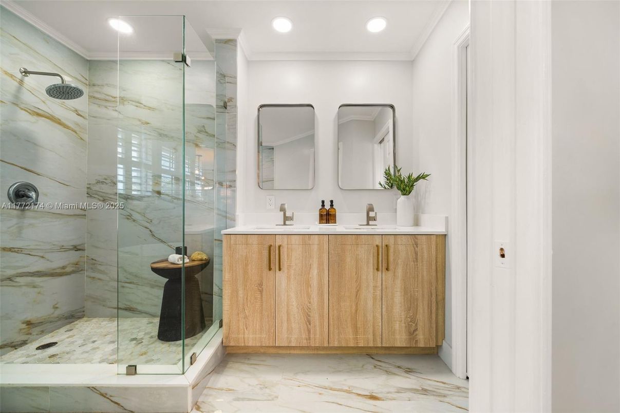 Bathroom, Dual Sink Vanities, Glass Shower, Interior, Marble, Marble Walls, Recessed Lighting
