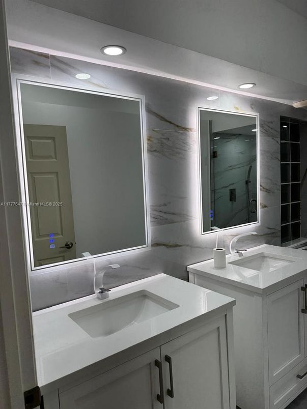 Bathroom, Dual Sink Vanities, Interior, Marble Walls, Recessed Lighting