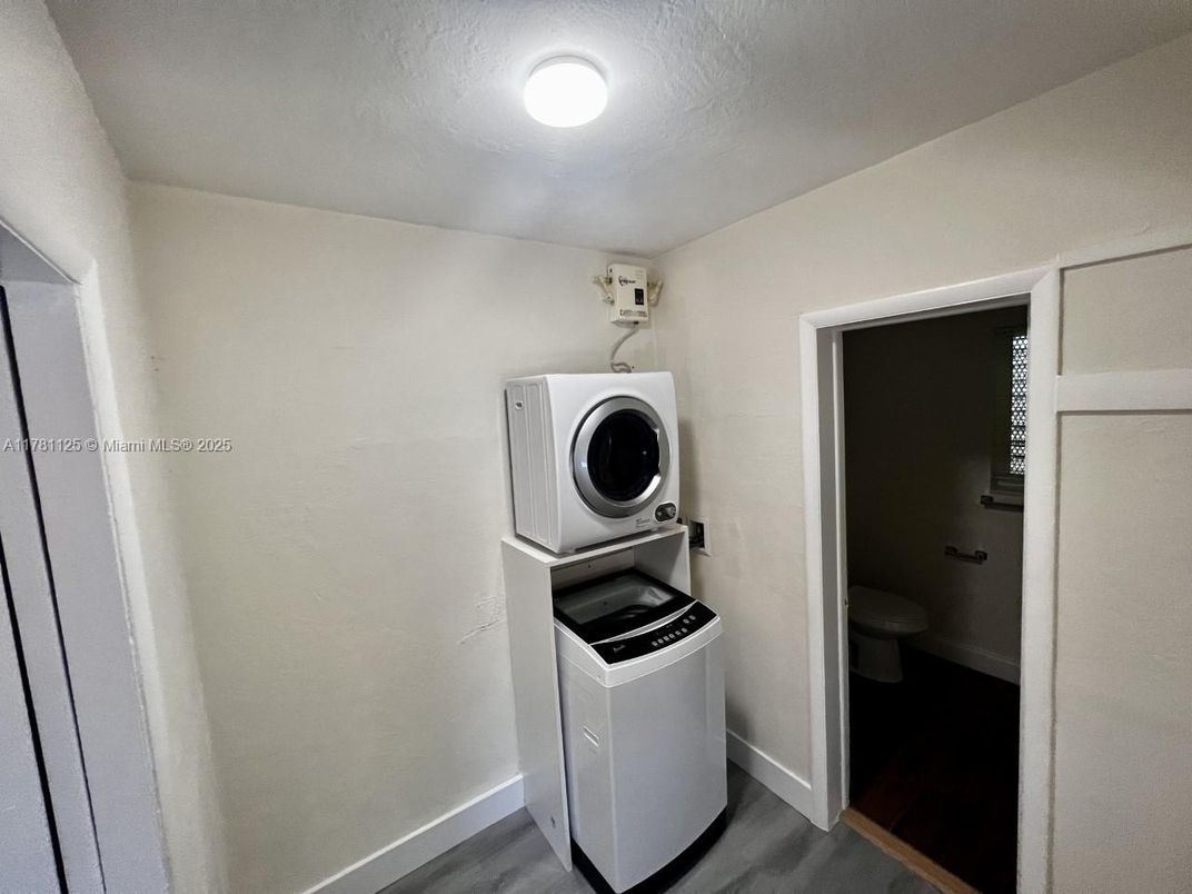 Bathroom, Interior, Utility Closets, Washer, Wood Texture Flooring