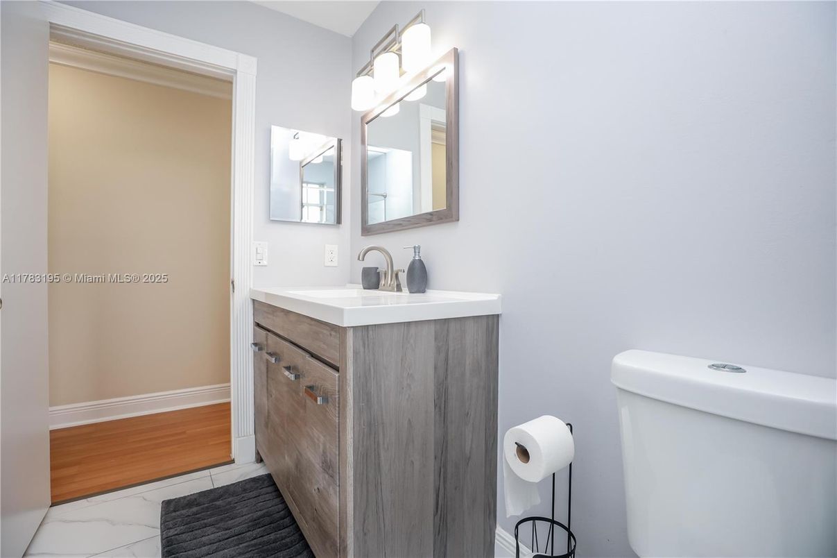 Bathroom, Dual Sink Vanities, Interior, Marble, Wood Texture Flooring