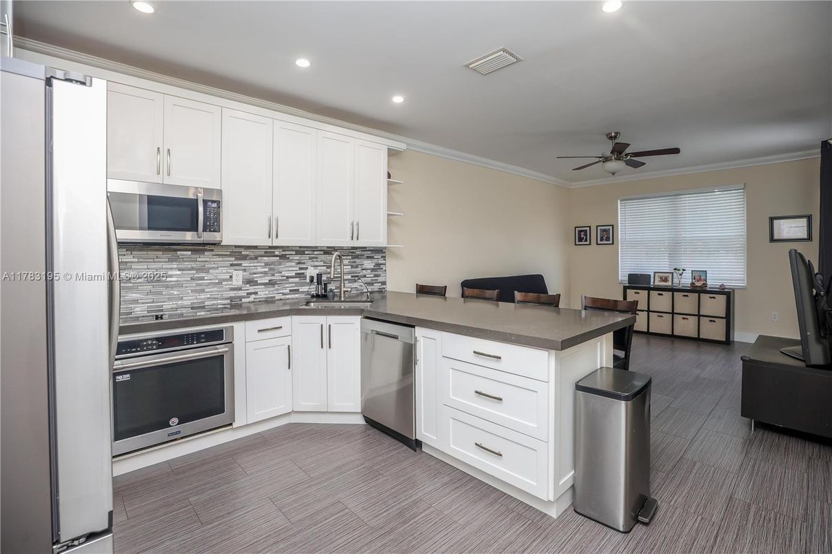 Interior, Kitchen, Recessed Lighting, Stainless Steel Appliances, Wood Texture Flooring