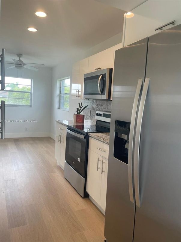 Interior, Kitchen, Recessed Lighting, Stainless Steel Appliances, Wood Texture Flooring