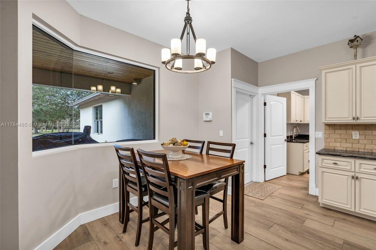 Chandelier, Dining room, Interior, Pendant Lights, Wood Texture Flooring