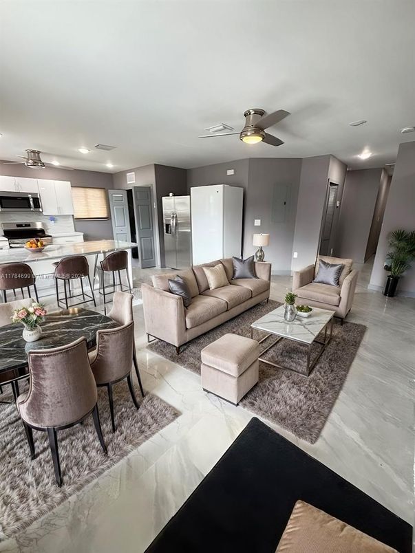 Dining room, Interior, Kitchen, Living room, Marble, Recessed Lighting, Stainless Steel Appliances