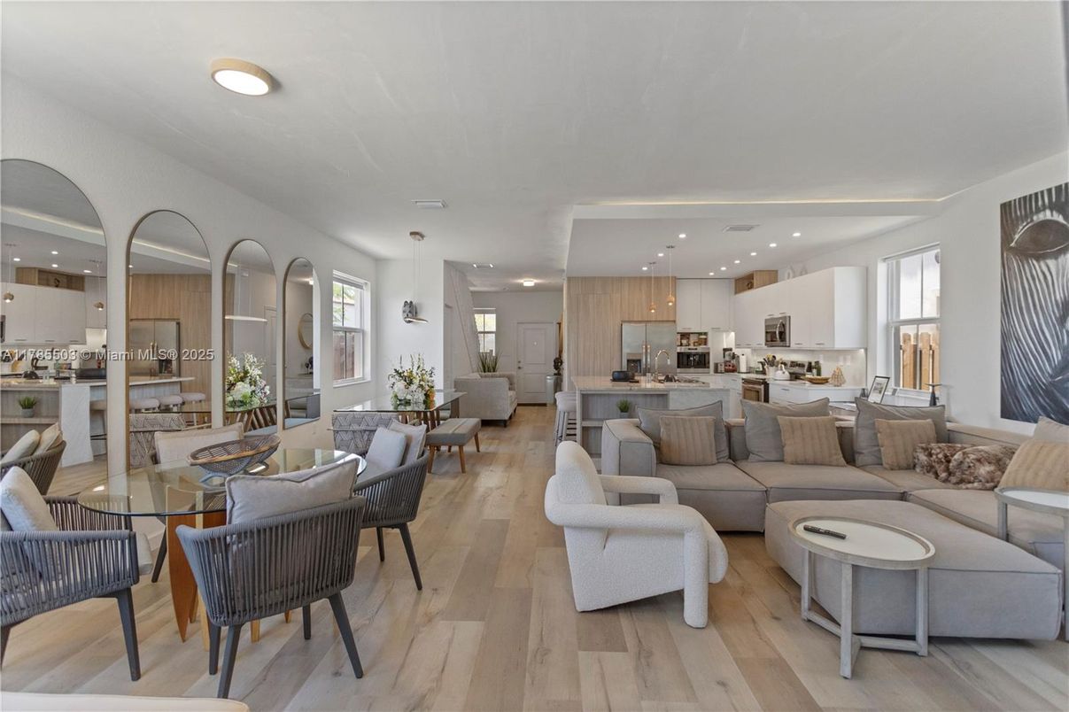 Dining room, Interior, Kitchen, Living room, Pendant Lights, Recessed Lighting, Stainless Steel Appliances, Wood Texture Flooring