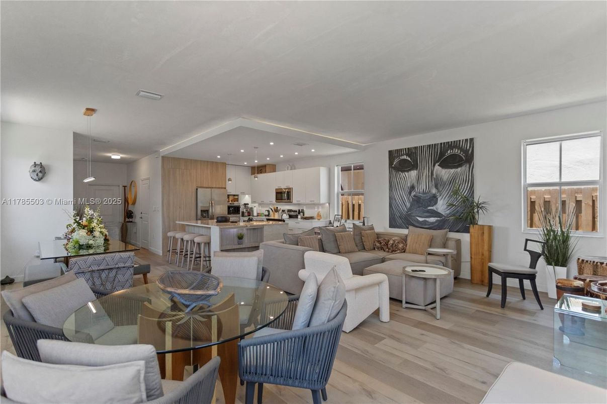 Dining room, Interior, Kitchen, Living room, Recessed Lighting, Stainless Steel Appliances, Wood Texture Flooring