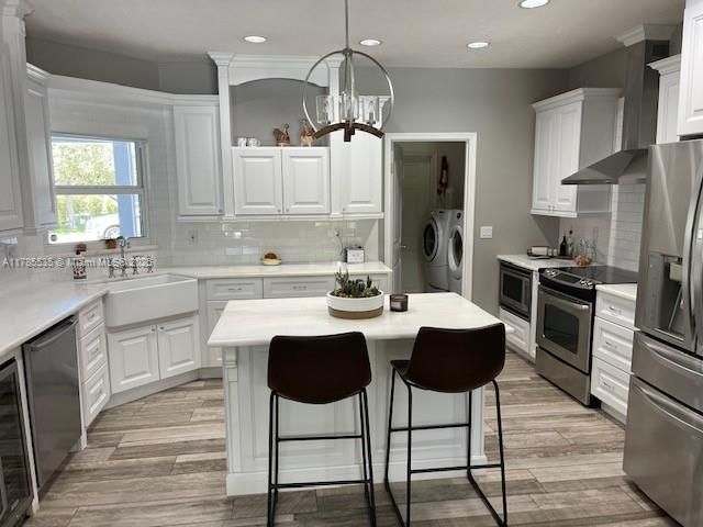Interior, Kitchen, Pendant Lights, Recessed Lighting, Stainless Steel Appliances, Washer, Wood Texture Flooring