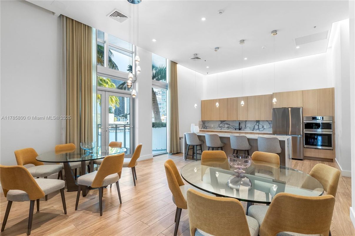 Dining room, Interior, Kitchen, Pendant Lights, Recessed Lighting, Stainless Steel Appliances, Wood Texture Flooring