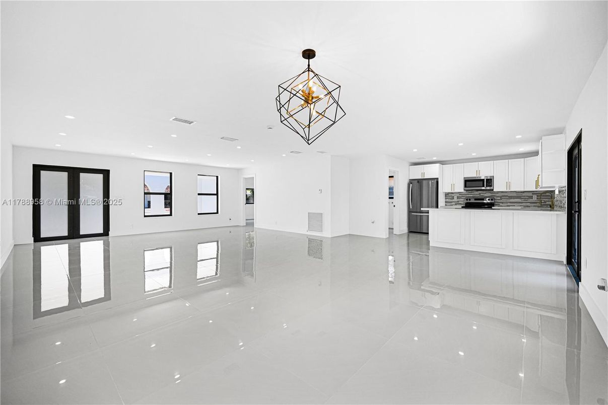 Chandelier, Empty room, Interior, Kitchen, Pendant Lights, Recessed Lighting, Stainless Steel Appliances