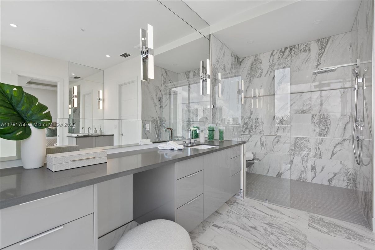 Bathroom, Dual Sink Vanities, Glass Shower, Interior, Marble, Marble Walls, Recessed Lighting
