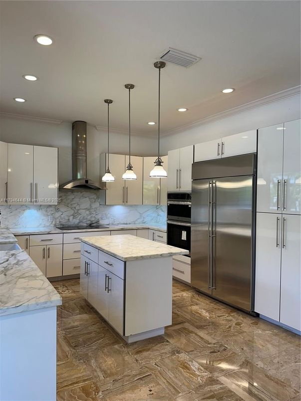 Interior, Kitchen, Marble Walls, Pendant Lights, Recessed Lighting, Stainless Steel Appliances, Wood Texture Flooring