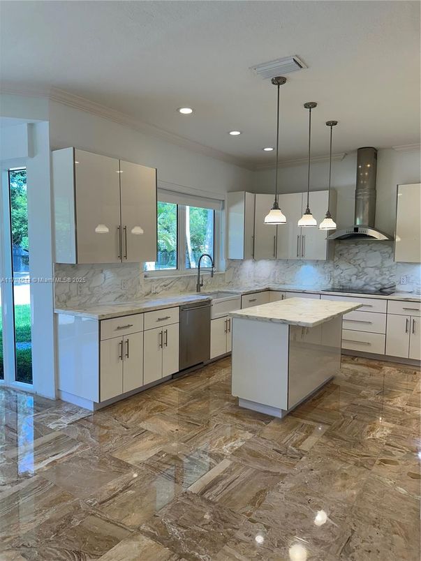 Interior, Kitchen, Marble Walls, Pendant Lights, Recessed Lighting, Stainless Steel Appliances