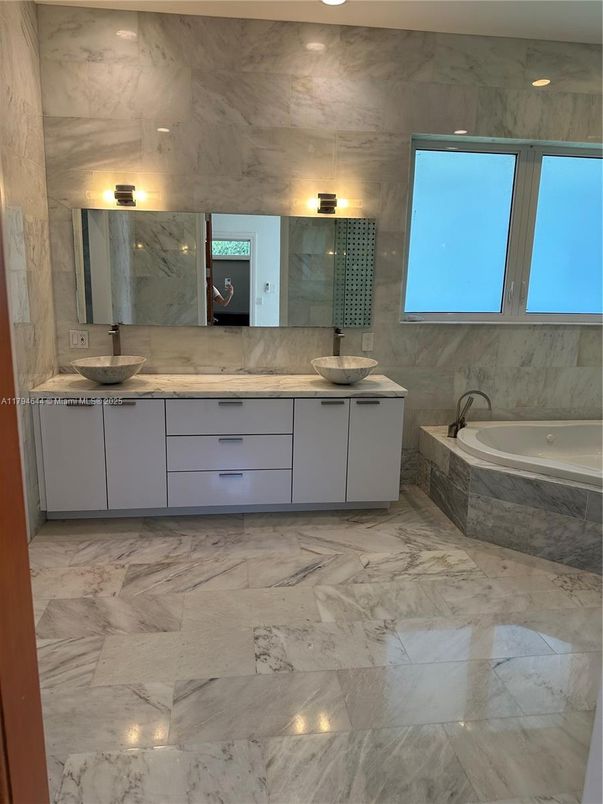 Bathroom, Dual Sink Vanities, Interior, Marble, Marble Walls, Recessed Lighting