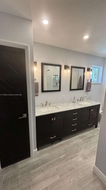 Bathroom, Dual Sink Vanities, Interior, Recessed Lighting, Wood Texture Flooring
