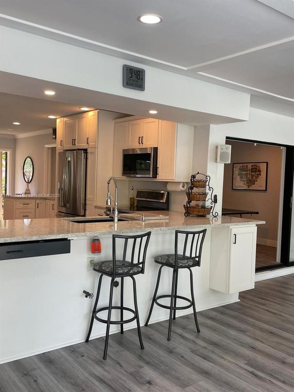 Interior, Kitchen, Recessed Lighting, Stainless Steel Appliances, Wood Texture Flooring