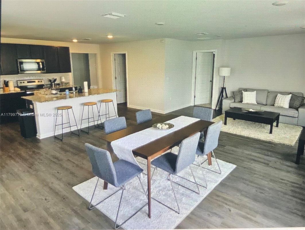 Dining room, Interior, Kitchen, Living room, Recessed Lighting, Stainless Steel Appliances, Wood Texture Flooring