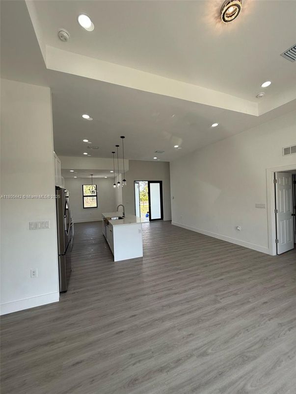 Empty room, Interior, Kitchen, Pendant Lights, Recessed Lighting, Wood Texture Flooring