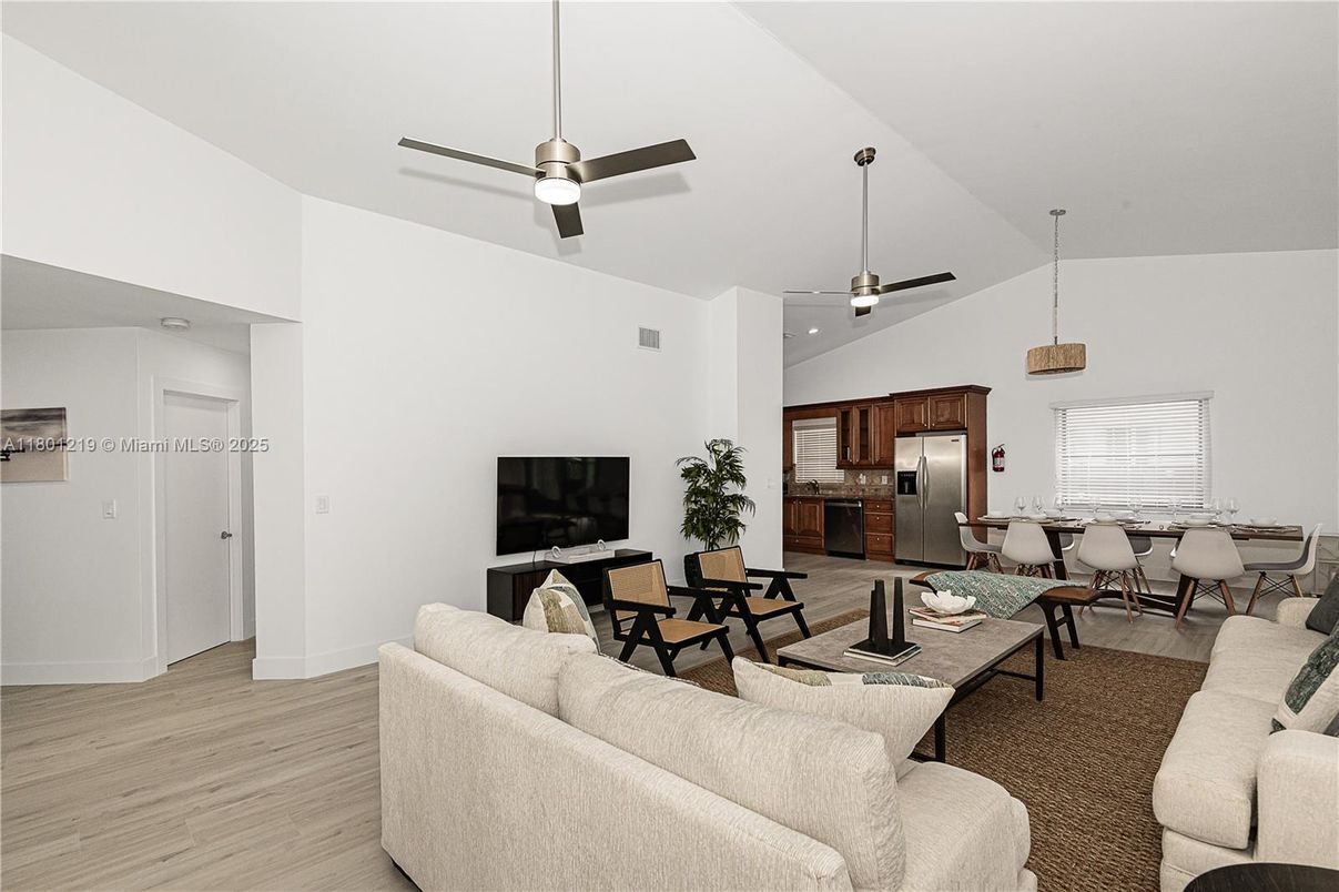 Dining room, Interior, Kitchen, Living room, Pendant Lights, Recessed Lighting, Stainless Steel Appliances, Wood Texture Flooring