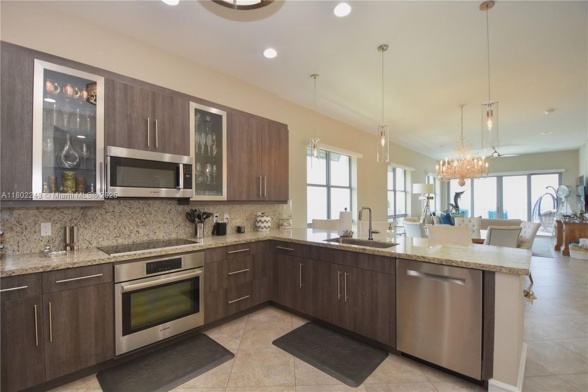 Chandelier, Dining room, Interior, Kitchen, Pendant Lights, Recessed Lighting, Stainless Steel Appliances