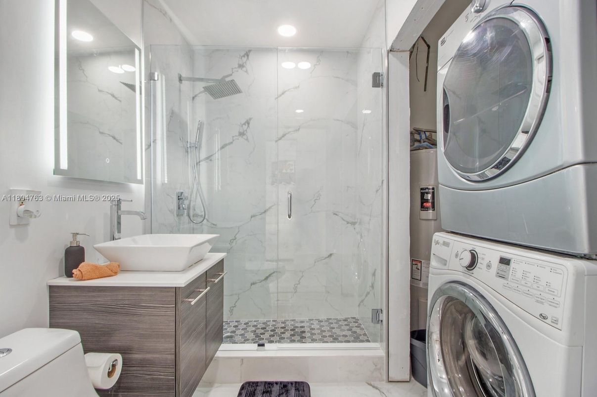 Bathroom, Glass Shower, Interior, Marble Walls, Recessed Lighting, Washer