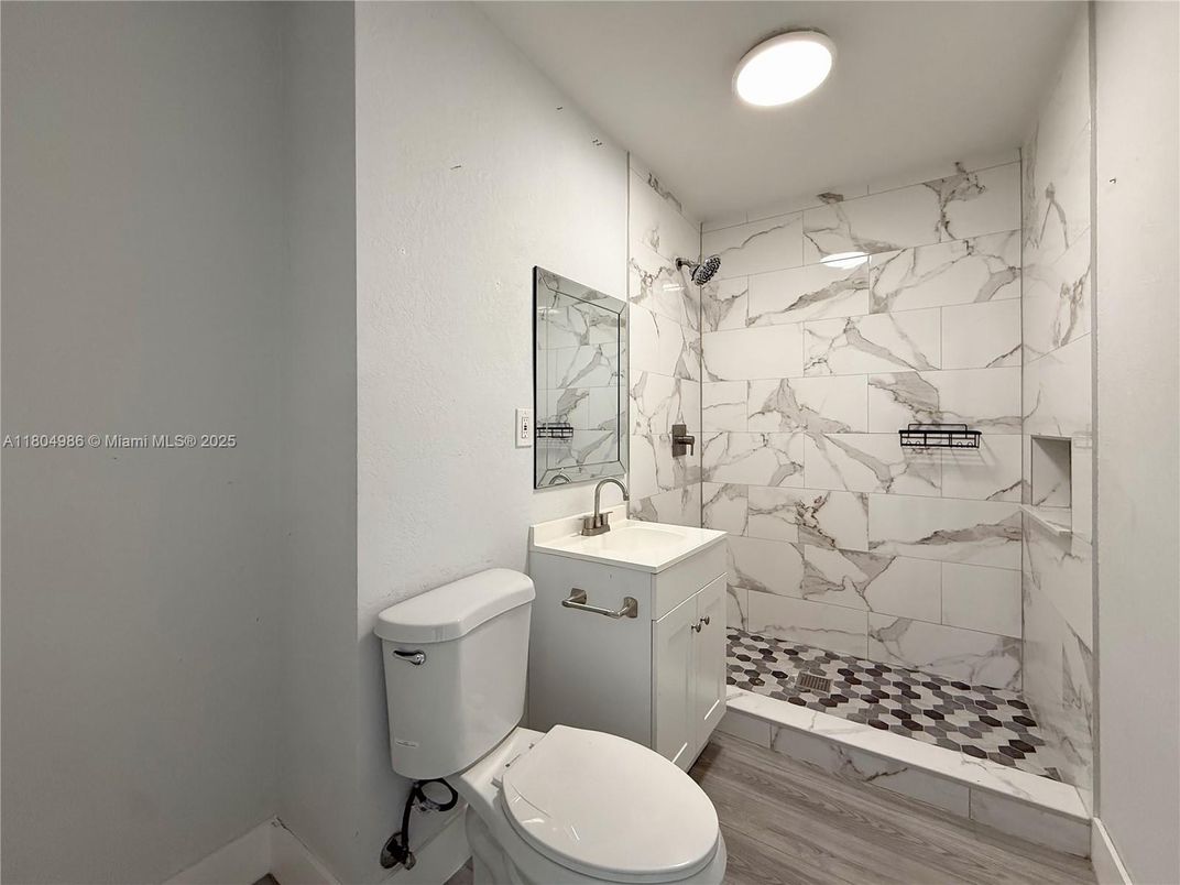 Bathroom, Interior, Marble Walls, Recessed Lighting, Wood Texture Flooring