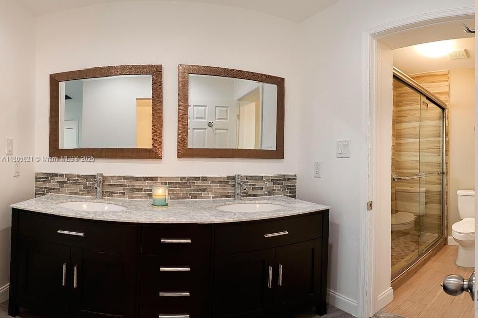 Bathroom, Dual Sink Vanities, Glass Shower, Interior, Wood Texture Flooring