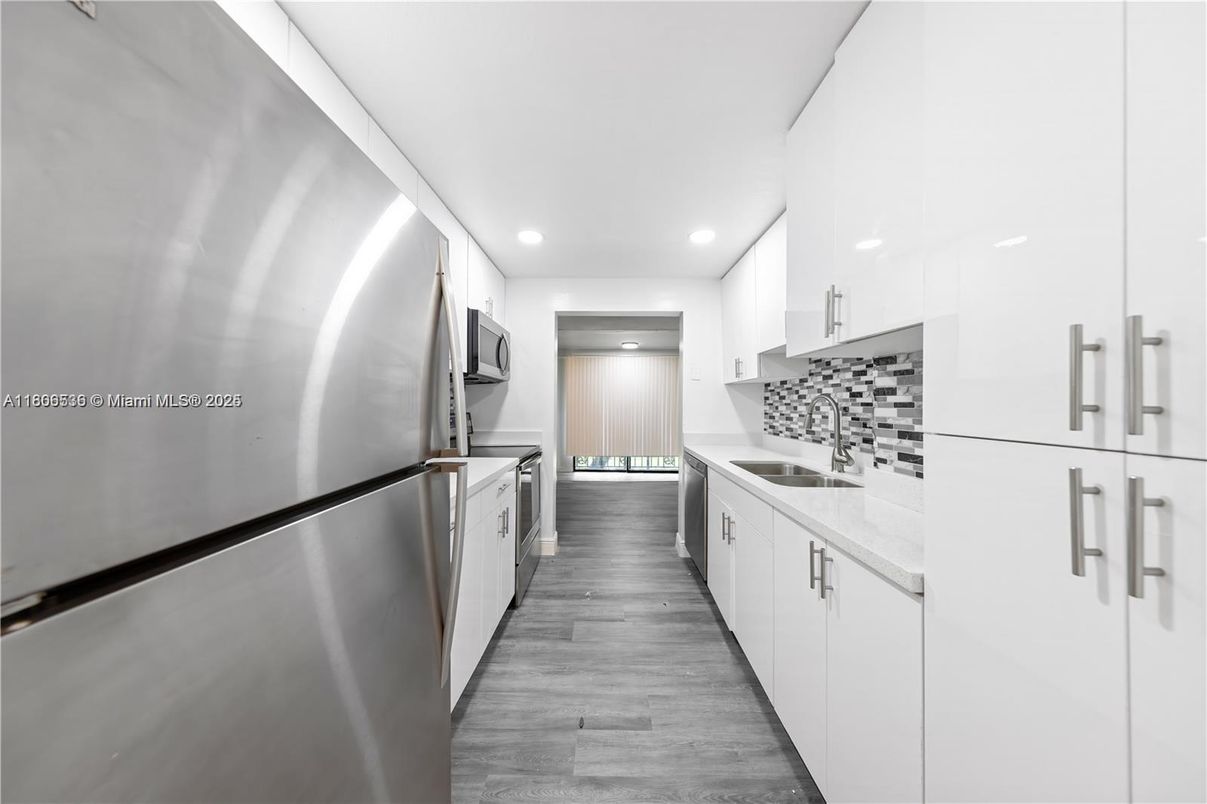 Interior, Kitchen, Recessed Lighting, Stainless Steel Appliances, Wood Texture Flooring