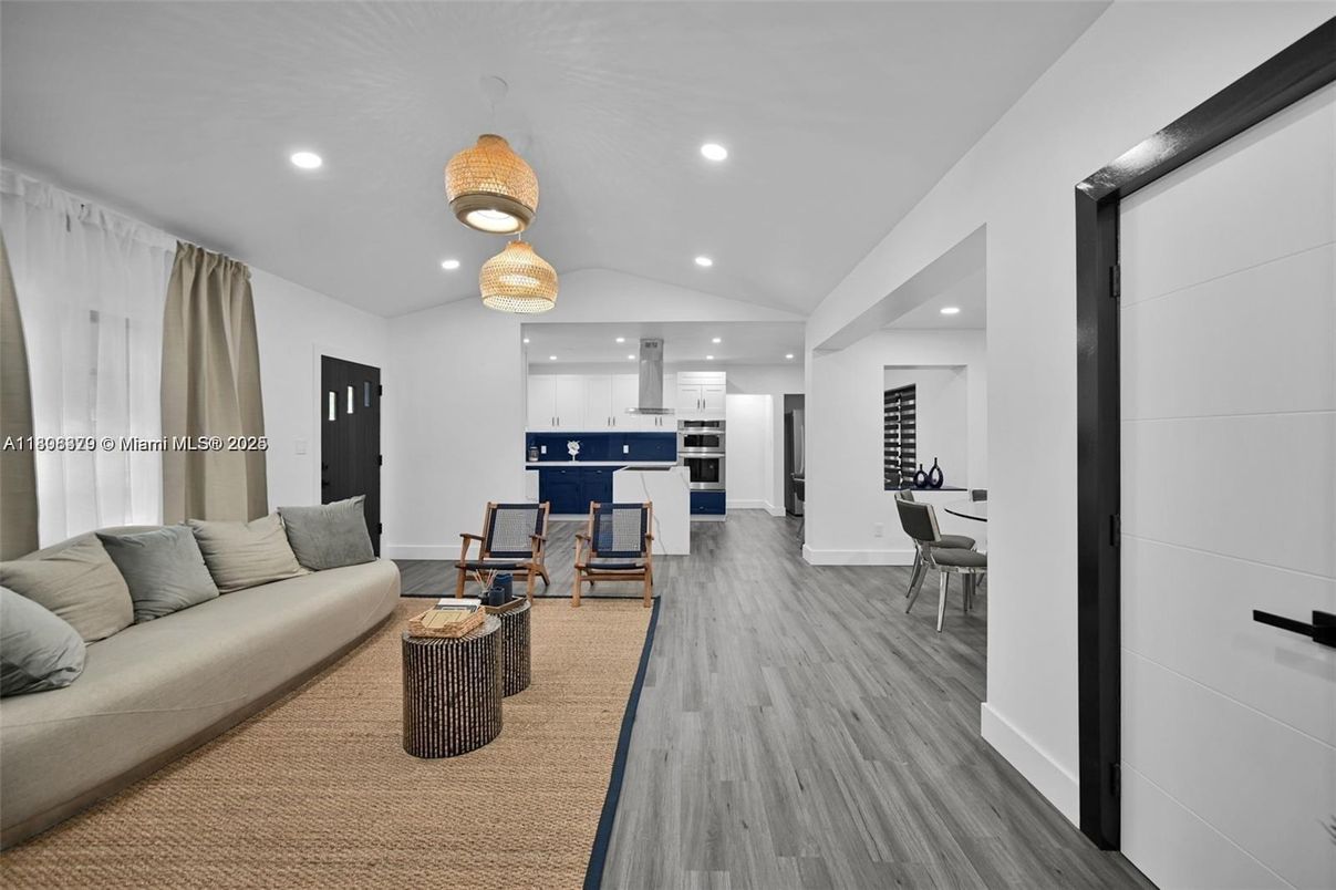 Chandelier, Dining room, Interior, Kitchen, Living room, Recessed Lighting, Stainless Steel Appliances, Wood Texture Flooring