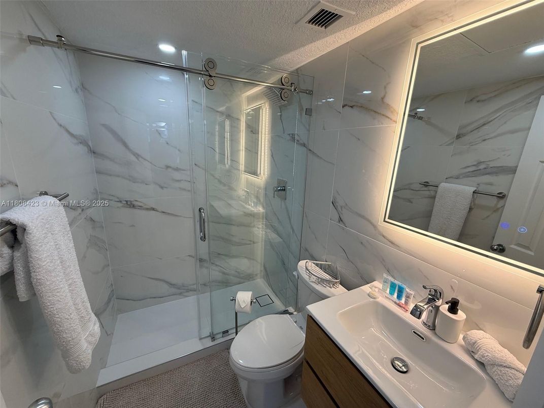 Bathroom, Glass Shower, Interior, Marble Walls, Recessed Lighting