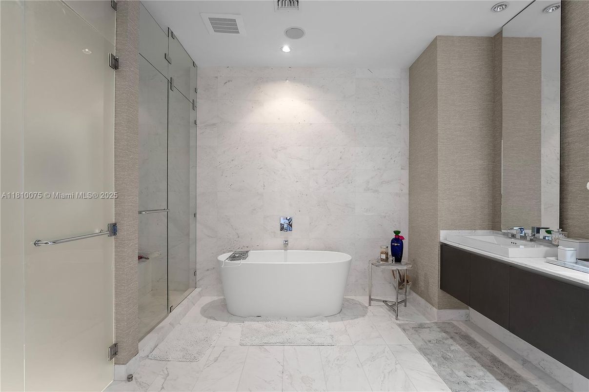Bathroom, Dual Sink Vanities, Free Standing Baths, Glass Shower, Interior, Marble, Marble Walls, Recessed Lighting