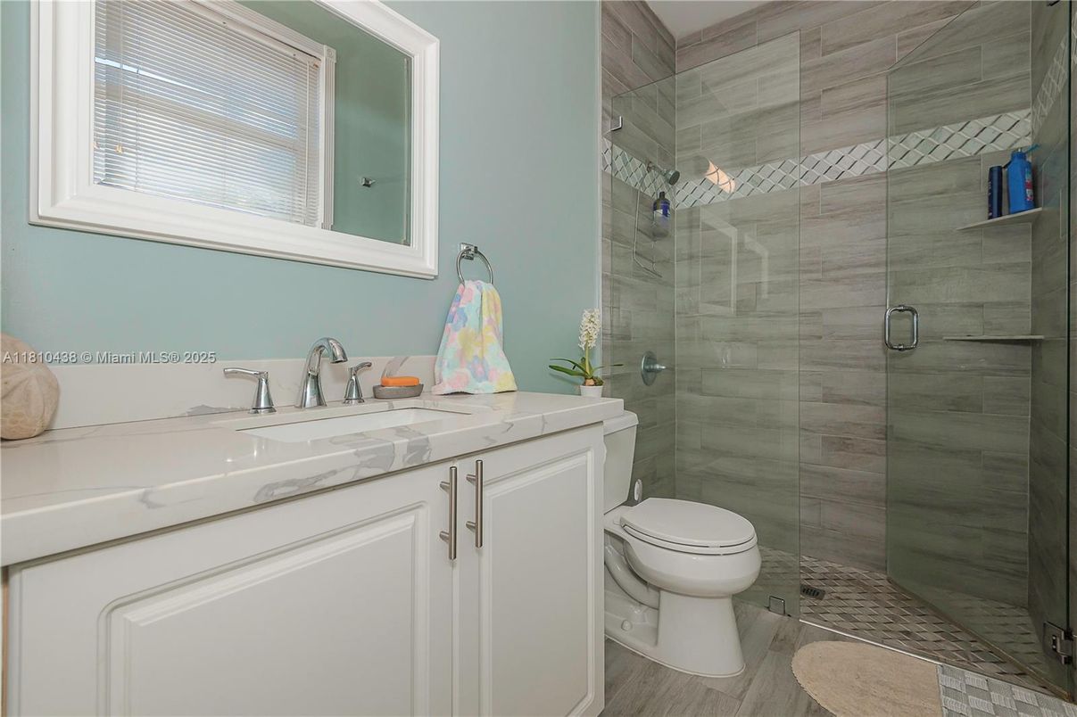 Bathroom, Glass Shower, Interior, Tile Countertops, Wood Texture Flooring