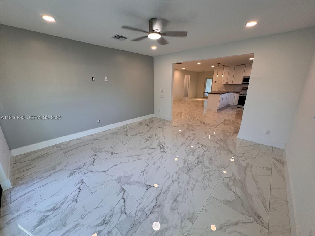 Empty room, Interior, Kitchen, Marble, Recessed Lighting, Stainless Steel Appliances
