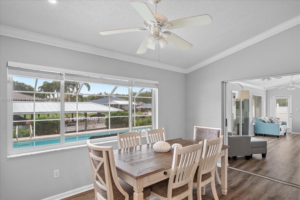 Dining room, Interior, Recessed Lighting, Sun Room, Wood Texture Flooring
