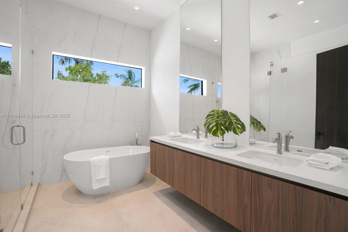 Bathroom, Dual Sink Vanities, Free Standing Baths, Glass Shower, Interior, Marble Walls, Recessed Lighting