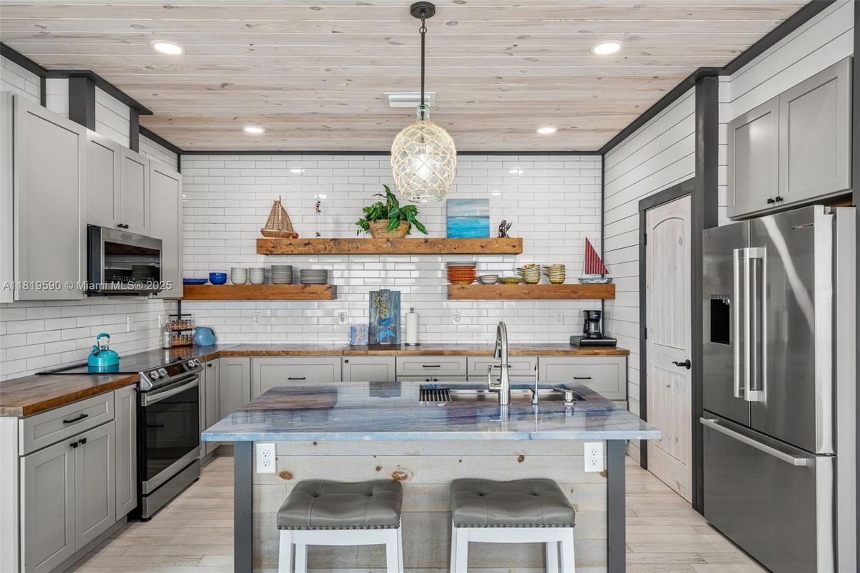 Interior, Kitchen, Pendant Lights, Recessed Lighting, Stainless Steel Appliances, Stone Walls, Wooden Ceilings, Wood Texture Flooring