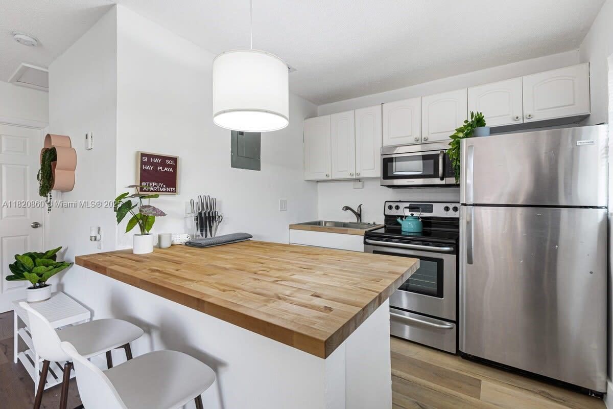 Interior, Kitchen, Pendant Lights, Stainless Steel Appliances, Wood Texture Flooring