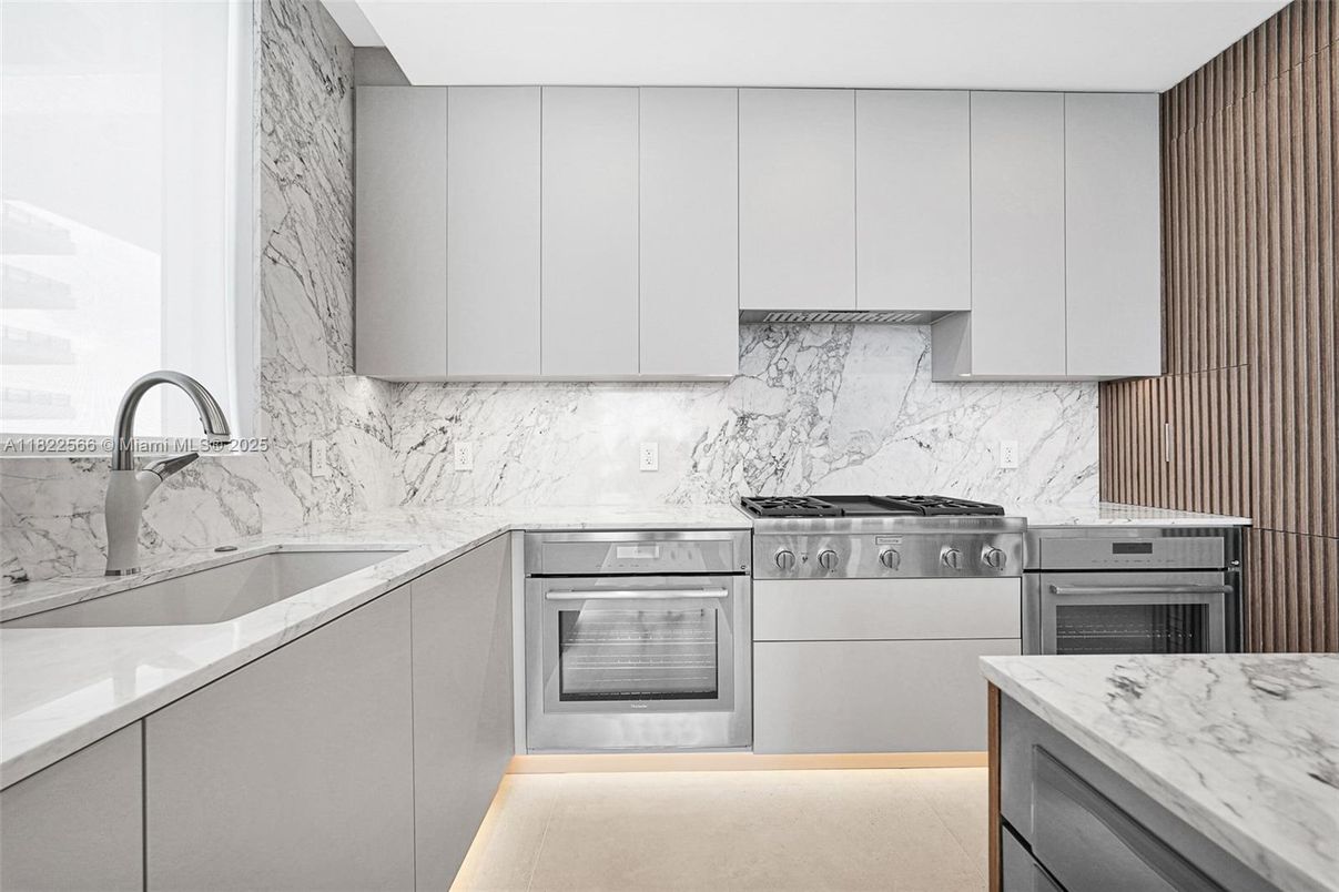 Interior, Kitchen, Marble Walls, Stainless Steel Appliances