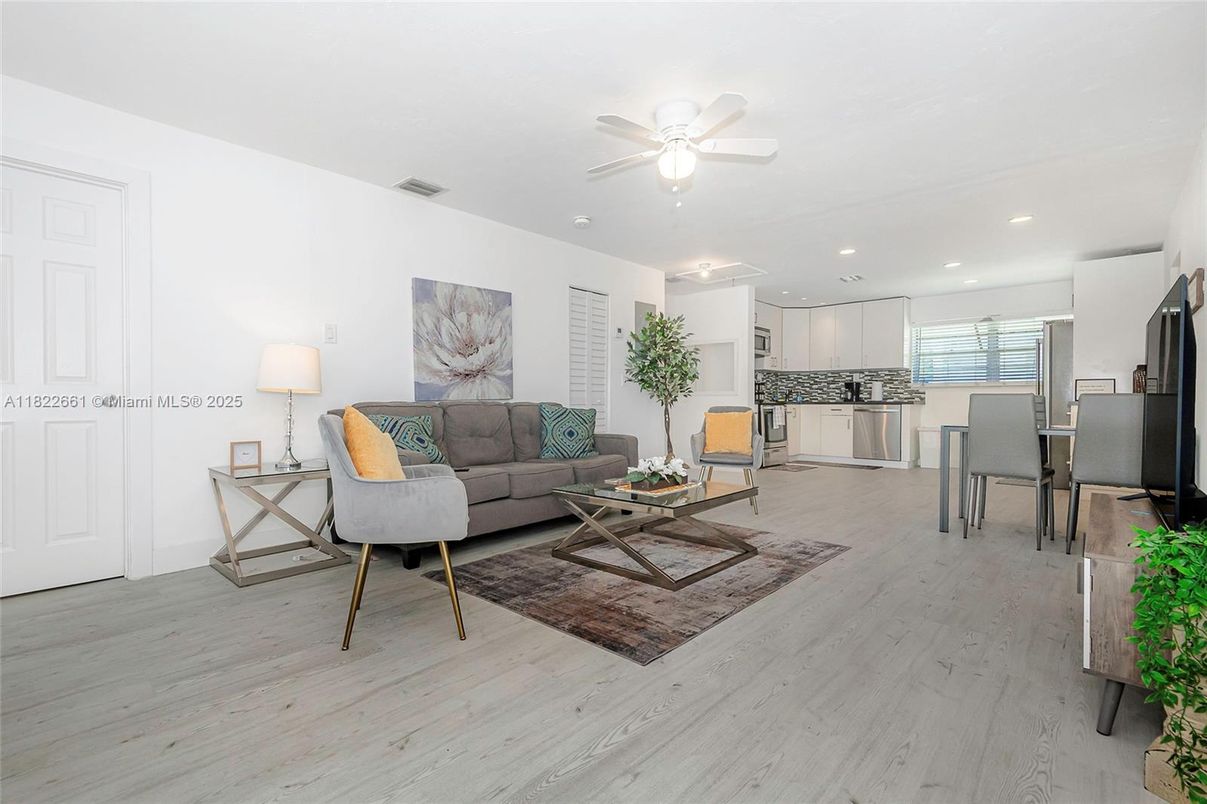 Dining room, Interior, Kitchen, Living room, Recessed Lighting, Stainless Steel Appliances, Wood Texture Flooring