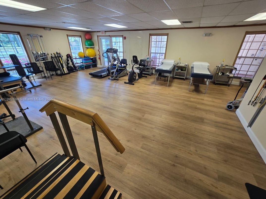 Fitness Equipment, Gym, Interior, Recessed Lighting, Wood Texture Flooring