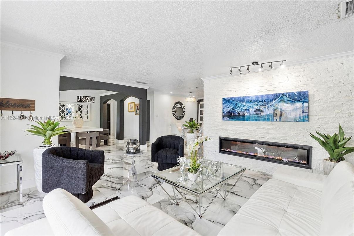 Fireplace, Interior, Living room, Marble, Recessed Lighting, Stone Walls