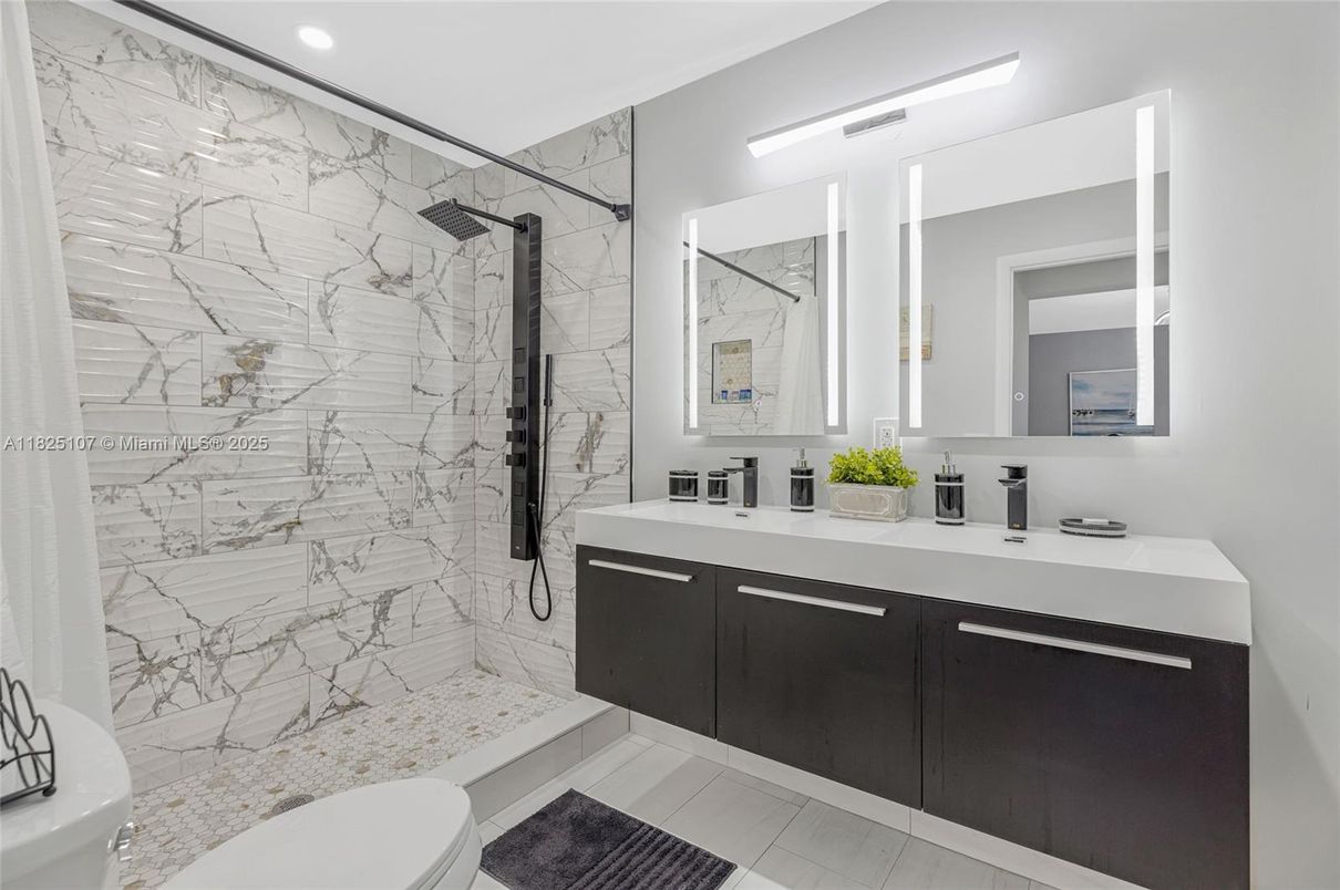 Bathroom, Dual Sink Vanities, Interior, Marble Walls, Recessed Lighting