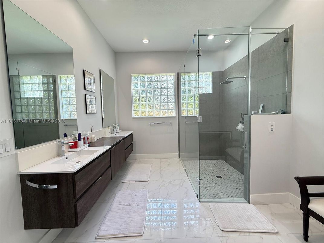 Bathroom, Dual Sink Vanities, Glass Shower, Interior, Marble, Recessed Lighting