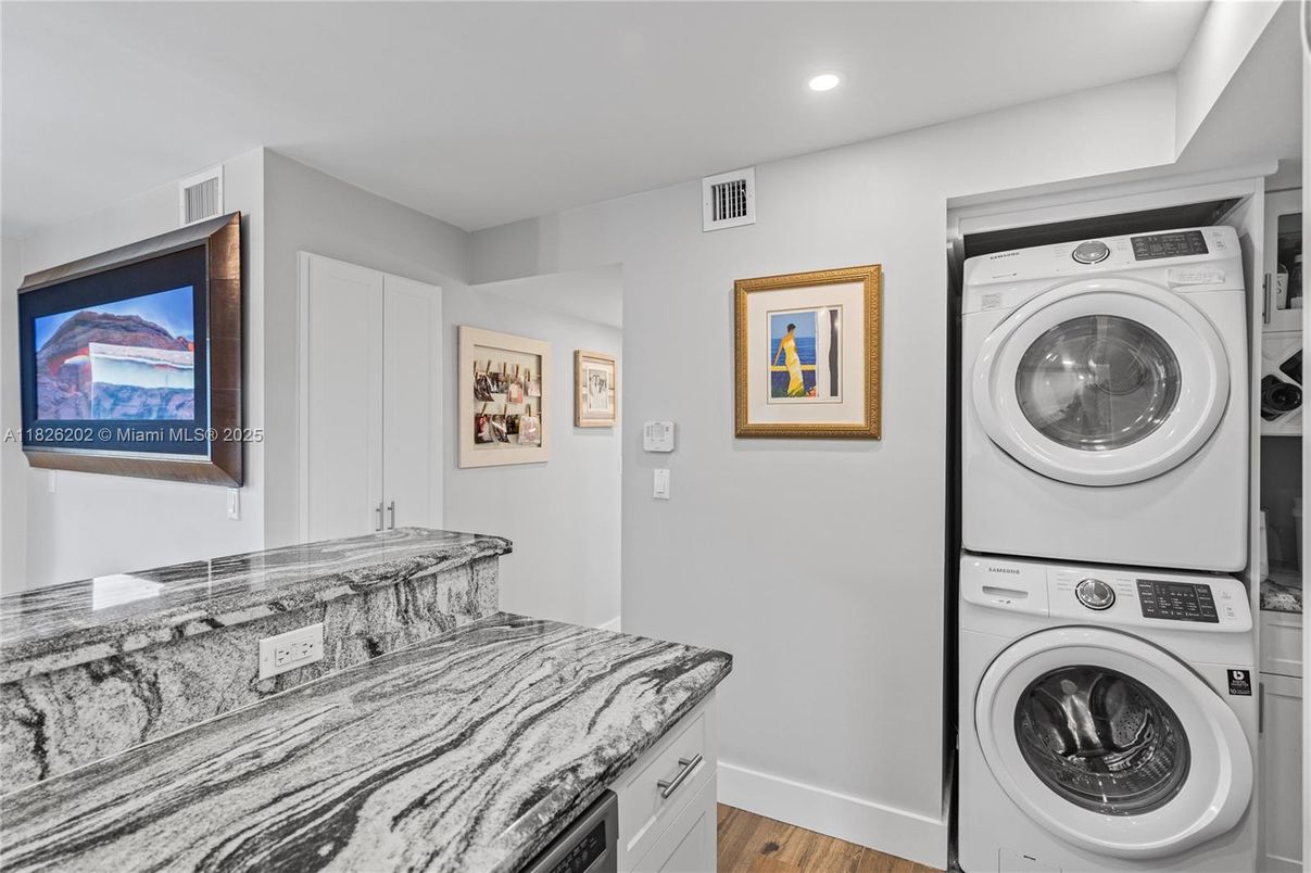 Bedroom, Interior, Recessed Lighting, Utility Closets, Washer, Wood Texture Flooring