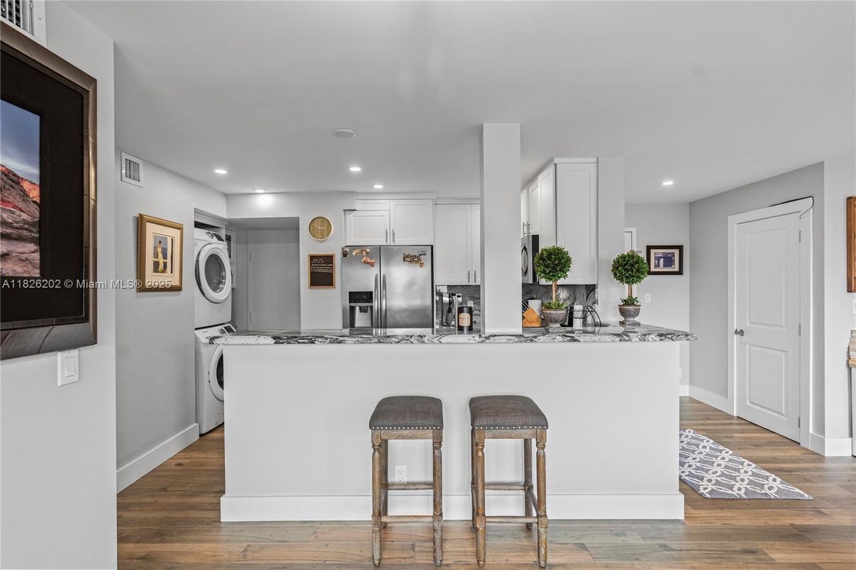 Interior, Kitchen, Recessed Lighting, Stainless Steel Appliances, Washer, Wood Texture Flooring